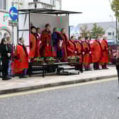 Elected members watch as the parade makes its way through The Square.