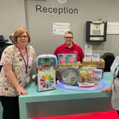 UNISON Trade Union Chair Gillian Foley (red shirt), Hospital Play Specialist’s Sharon Pauley and Gillian Sinclair receive the donation of sensory equipment. Pic credit: SEHSCT