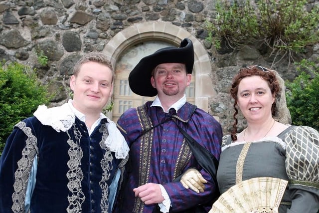 Arguably not quite as well known as Carrick's more vaunted locations, the town's rich built heritage includes its historic walls. This photo features 'Dancing Master Mr Maguire', 'Sir Arthur Chichester' and 'Lady Letitia Chichester' at a 2009 Walled Town Day celebration event in Carrick. CT35-453RM: