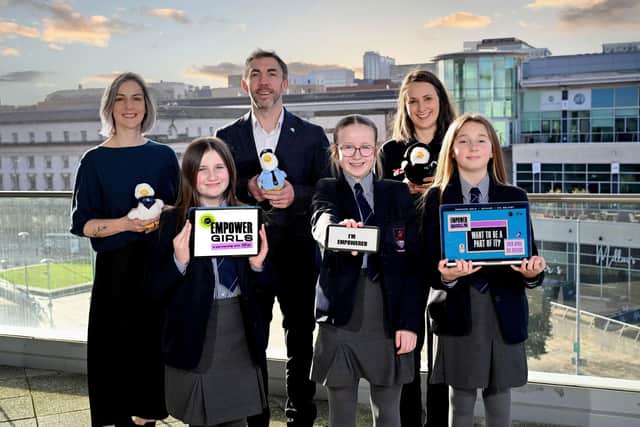 Pictured (L-R) with Caeris, Darcy & India, Year 8 students from Larne Grammar School are Catherine McCourt and Tom Trainor from sponsors Aflac and Sara Lyons, CyberFirst NI Project Manager.