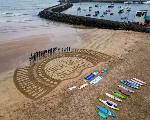Portrush's West Strand was one of 30 venues around the UK hosting a paddle out protest organised by Surfers Against Sewage on Saturday, May 18.