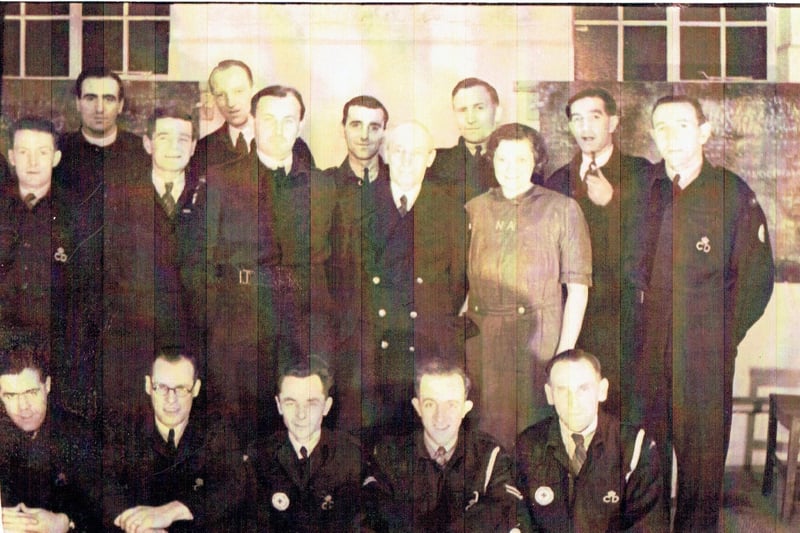 Carrickfergus Civil Defence Volunteers, 1940s. The Civil Defence Service included the ARP Wardens Service as well as firemen (AFS) (later National Fire Service (NFS)), fire watchers (later the Fire Guard), rescue, first aid post and stretcher parties.