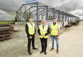 Brendan McGuigan (Director of Advanced Manufacturing and Engineering in Invest NI), Economy Minister Conor Murphy MLA and Matt Connery (CEO, Topframe Engineering). (Pic: Department for the Economy).