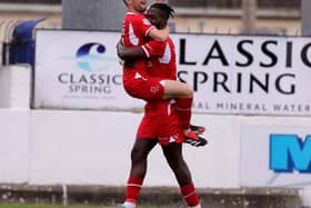 Goal scorer and provider celebrate the opener