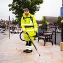 Michael Gourley, Waste Resource Management Supervisor at Antrim and Newtownabbey Borough Council with the new cleansing equipment in action on the streets of Ballyclare. (Pic: Antrim and Newtownabbey Borough Council).