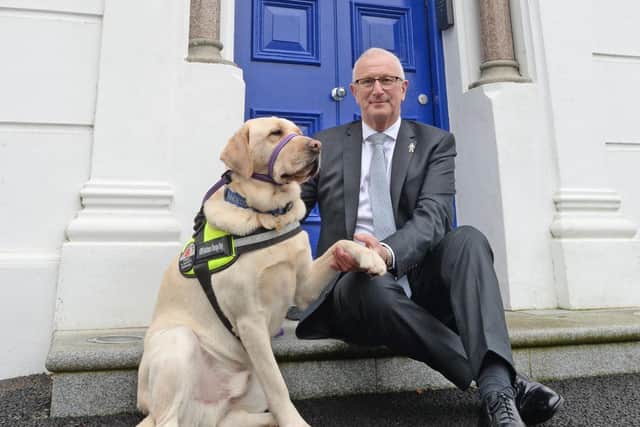 Leslie Nixon, Assistant Grand Master of the Freemasons of Ireland is pictured with Lexi from Assistance Dogs NI
