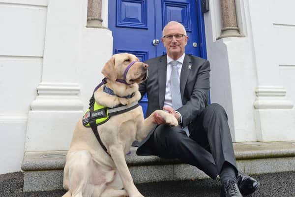Leslie Nixon, Assistant Grand Master of the Freemasons of Ireland is pictured with Lexi from Assistance Dogs NI