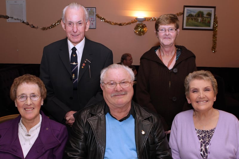 Smiling for our cameraman at the RBL Senior Citizens Christmas dinner back in 2009 in Ballymoney are Fred Baird, Elizabeth Cunningham, Jean Yeomans, Ronald Yeomans and Phyllis Baird