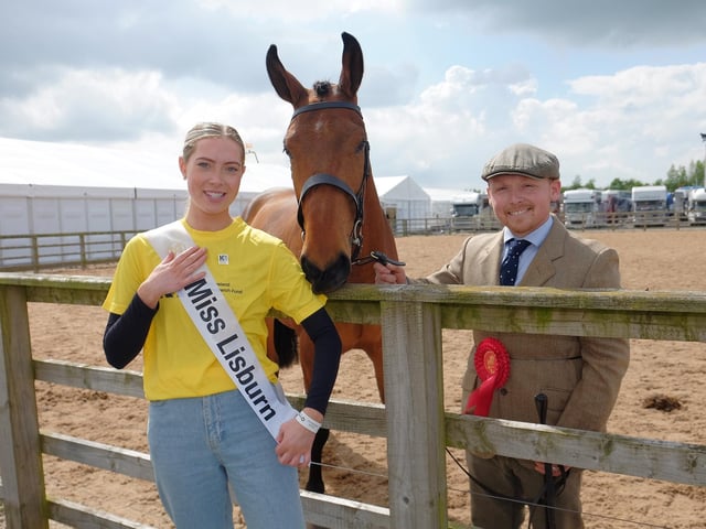 Northern Ireland Kidney Research Fund's newest ambassador - Miss Top Model NI and specialist renal nurse Hannah Johns - with Simon Carson and the prize winning Kootenay Bay.