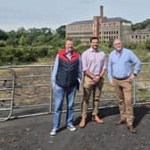 The UUP’s Doug Beattie MLA and Alderman Ian Burns with Richard Lutton at the site of the former Gilford Mill.