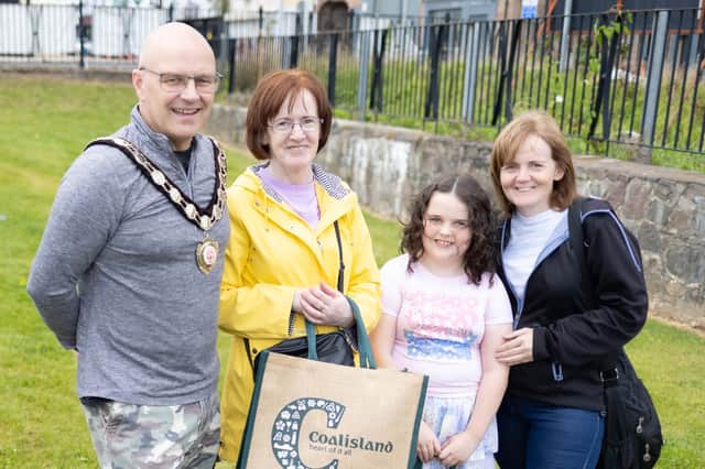 Mid Ulster Council Chairperson Councillor Dominic Molloy pictured with some of the people who attended Town Centre Saturday in Coalisland.