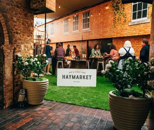 At the top of Royal Avenue, the outdoor portion of this venue has become one of the hottest places for an alfresco drink or dinner.
From pizzas to loaded fries and nachos, be sure to check out what all the fuss is about! The former Hudson bar creates a laid back atmosphere with carefully subtle local references to create a truly appealing atmosphere.
Following a £250,000 investment intended to kickstart the revival of the Union Quarter, the first floor also houses a dedicated gin bar, with up to 40 choices, while a wide-ranging drinks menu offers both classic cocktails and local beer and ale.
For more information go to haymarketbelfast.com