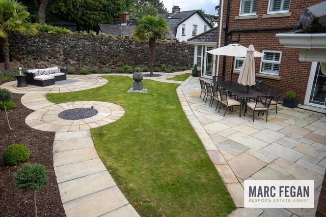 The gardens are beautifully landscaped and designed for family life, with a perfect mix of patio and lawn and complete with lighting throughout.