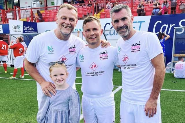 Carl Frampton pictured with former Northern Ireland players Jim Magilton and Keith Gillespie at the charity match in Larne.