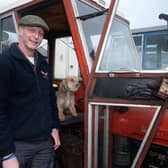 One man and his dog...Nathan Cross and his dog, Max pictured with his Massey Ferguson 35X vintage tractor before the Co Armagh Vintage Vehicle Club charity tractor run in aid of Dementia NI. PT12-270.