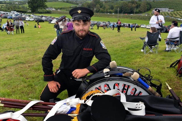 Jack Farrell of Annaghmore Crown Defenders band was left in charge of the band's instruments at the field during the RBP Last Saturday parade in Loughgall. PT35-207.