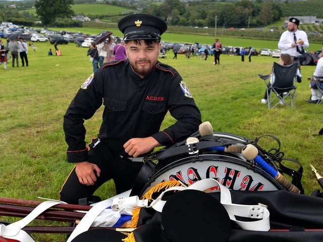 Jack Farrell of Annaghmore Crown Defenders band was left in charge of the band's instruments at the field during the RBP Last Saturday parade in Loughgall. PT35-207.