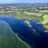A photo taken by police officers from the PSNI helicopter on Sunday shows a return of algal blooms on Lough Neagh.