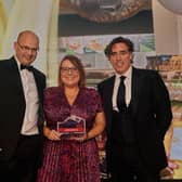 Jennifer Young from Henderson Group accepts the Forecourt Trader Award for Best Community Engagement on behalf of P&G EUROSPAR, Portadown. Also pictured are Phillip Brodie (left) from sponsor Essar and Awards host, Stephen Mangan. Picture: supplied by Henderson Group.