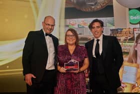 Jennifer Young from Henderson Group accepts the Forecourt Trader Award for Best Community Engagement on behalf of P&G EUROSPAR, Portadown. Also pictured are Phillip Brodie (left) from sponsor Essar and Awards host, Stephen Mangan. Picture: supplied by Henderson Group.