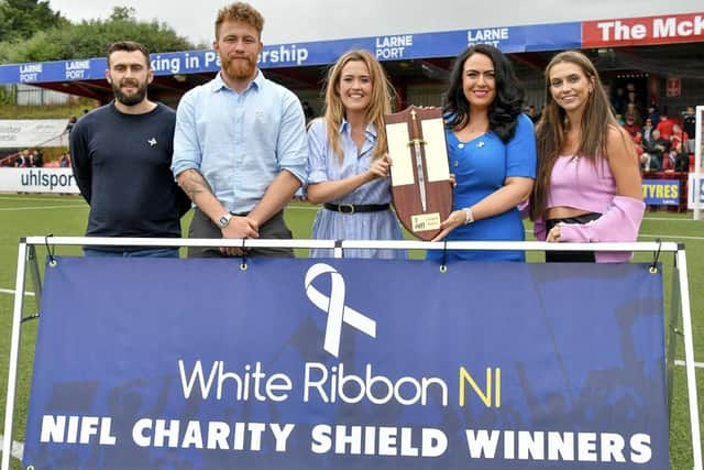 The White Ribbon NI team at the Charity Shield in Larne on July 1.  Photo by: Bill Guiller