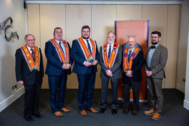 Members of Glenanne Crown Prince LOL 133, Markethill District,  receive the Outstanding Community Service Award from sponsors Norman Nicholl, of NC Engineering, and Andrew Green, of TL Dallas. The award was in recognition of their work on ‘The Glen’ project. Pic by Graham Baalham-Curry