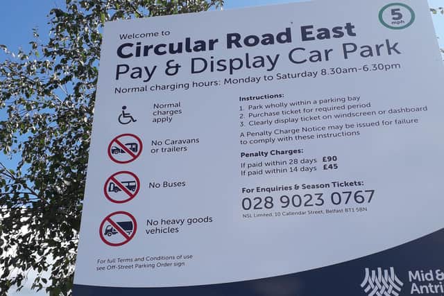 The notice explaining parking fees at the Circular Road East car park in Larne.  Picture: Local Democracy Reporting Service.