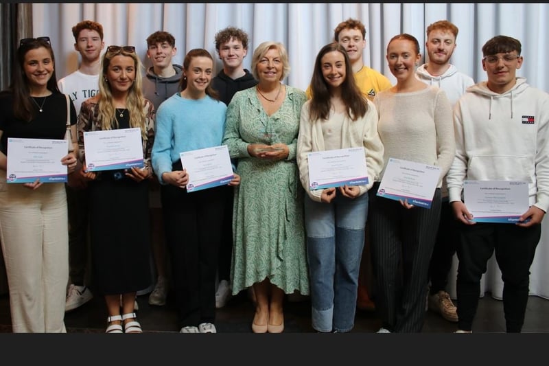 Some of the younger volunteers and students, who played a part in the Covid-19 testing service, with Collette Fitzgerald, test centre manager.
