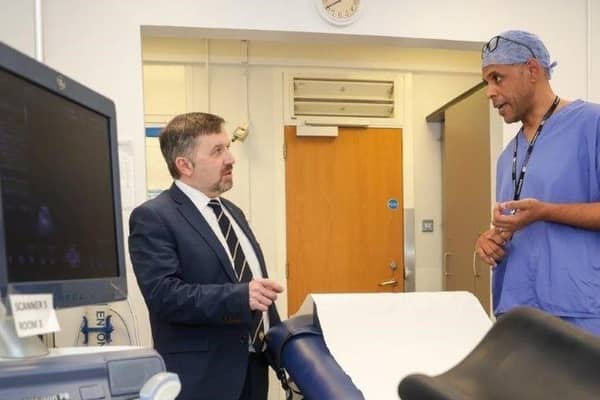 Health Minster Robin Swann with Dr Ishola Agbaje, Consultant Gynaecologist. Credit Department of Health