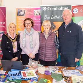 Mayor Cllr Dawn Huggins with Deirdre Goodlad of Glinnti Irish Language Group and members of Dunloy Comhaltas.