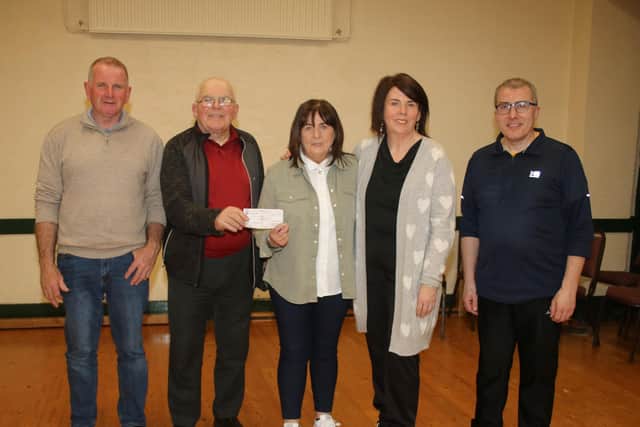 Presenting a cheque for £360 to SAH proceeds from Indoor Bowling Charity Pairs in Warrenpoint Panto Club last Tuesday evening are L – R Mickey Morgan (Son), Jimmy McAlinden (presenting cheque for £360), Teresa Russell (Daughter), Martina Gaine (Daughter), and Darren O’Hare (Chairman Warrenpoint Panto Bowling Club).