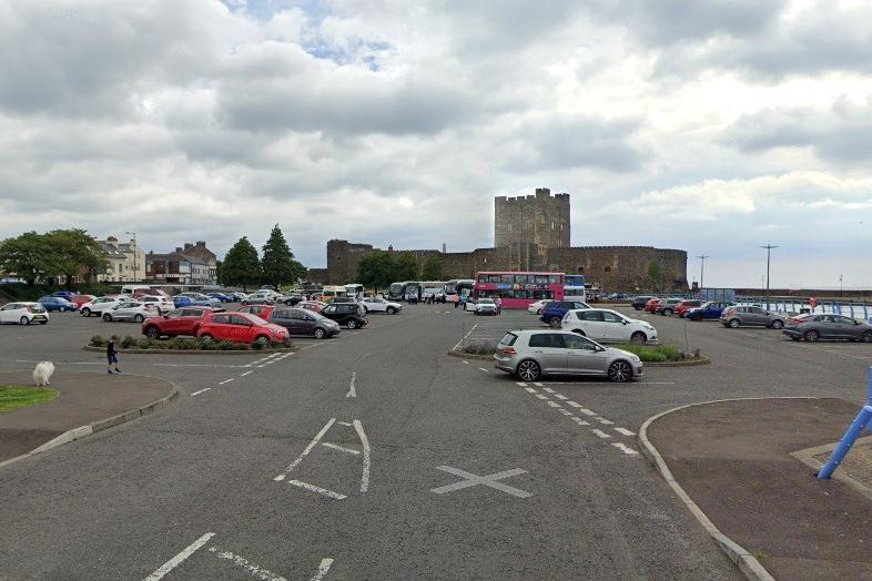 Dwindling numbers of free parking spaces in the town centre is a further talking point for Carrick locals.  It follows proposals by Mid and East Antrim Borough Council to introduce charges at Carrick Castle car park (pictured).
