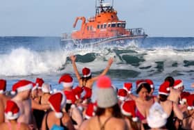 Get ready to dive into the festive spirit as the much-anticipated Portrush Santa Splash returns this year to a new location on West Strand! CREDIT PYC