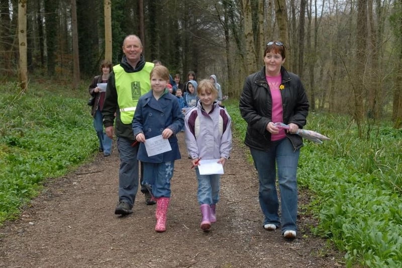 Seamus Milliken keeps Niamh and Veronica Mullen and Maeve McNamee on track during the Easter Egg Trail in Glenarm Forest in 2007. LT15-327-PR