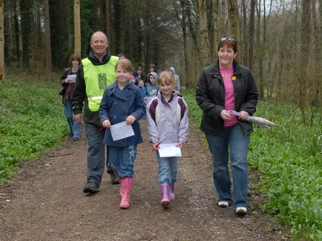 Seamus Milliken keeps Niamh and Veronica Mullen and Maeve McNamee on track during the Easter Egg Trail in Glenarm Forest in 2007. LT15-327-PR