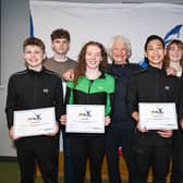 Pictured (l-r) are Conor Blakeman, Daniel Orr, Paige Woods, Lady Mary Peters, Christopher Chee, Roisin McKenna and Jeffrey Rong. Pic credit: Mary Peters Trust