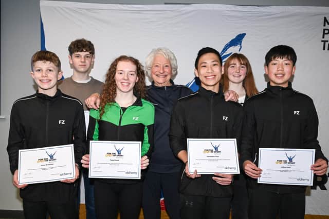 Pictured (l-r) are Conor Blakeman, Daniel Orr, Paige Woods, Lady Mary Peters, Christopher Chee, Roisin McKenna and Jeffrey Rong. Pic credit: Mary Peters Trust