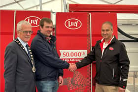 John Hennin (Royal Ulster Agricultural Society President), David Cargill and Jim Irwin (Lely)