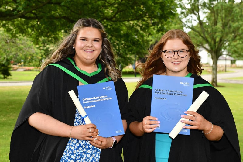 Emma Cusick from Greyabbey and Rebekah Evans from Desertmartin celebrate their graduation from CAFRE Greenmount Campus with foundation degrees in Agriculture and Technology. They are continuing their studies with CAFRE with the aim of attaining a BSc (Honours) degree in Sustainable Agriculture through one year of further study.