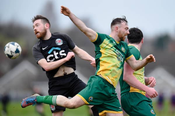 Ballyholland's Ryan Connolly scored twice as they progressed in the Fr Davies Cup on Saturday.