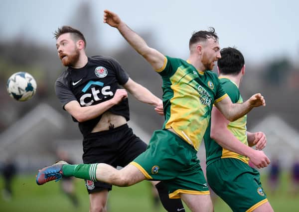 Ballyholland's Ryan Connolly scored twice as they progressed in the Fr Davies Cup on Saturday.