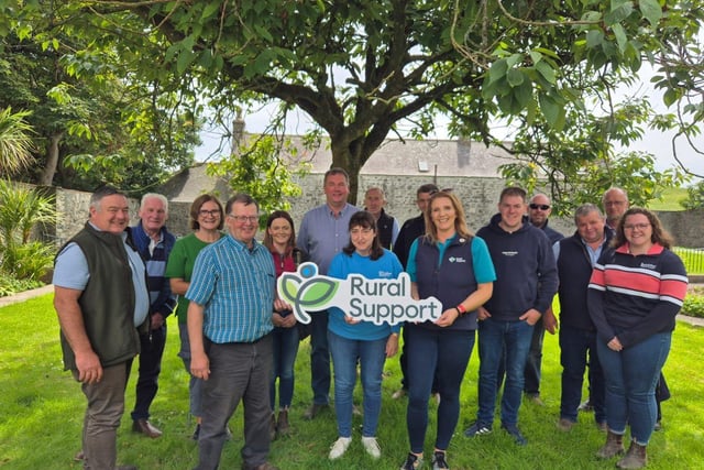 Lamont Hair from Scotland showcasing his family farm to a group of NI Farmers
