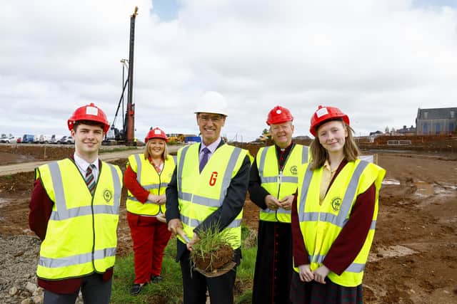 Head Boy, Aidan Cassidy, Fiona Kane, Principal, St Ronan’s College, Lurgan, Dr Mark Browne, Permanent Secretary of the Department for Education, Archbishop Eamon Martin, and Head Girl, Olivia Murtagh at the site on which the new £56m project will be built.