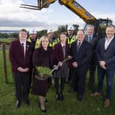 Education Minister Michelle McIlveen is joined by school and project team representatives at the sod-cutting ceremony.
