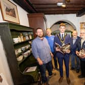 Mayor of Causeway Coast and Glens Councillor Ciarán McQuillan at the reopening of Ballycastle Museum pictured alongside (l-r) Nic Wright, Ballycastle Project Officer, Causeway Coast and Glens Museum Services, Brian Molloy, Chairman of the Friends of Ballycastle Museum, Peter Molloy and Roger Perrit. CREDIT CAUSEWAY COAST AND GLENS COUNCIL
