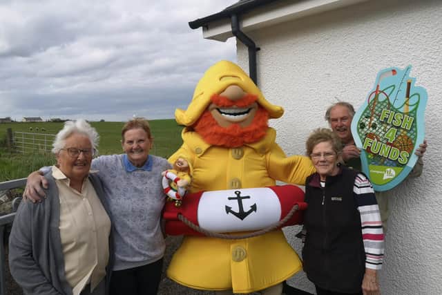 Staff from Ballintoy Young at Heart group. CREDIT COMPARE NI