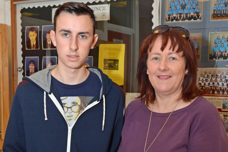 Niall O'Hagan is pictured with his mum Margarette as he receives his GCSE results at the Edmund Rice College in 2013. INNT 35-004-PSB