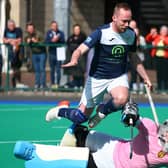 Portrush stopper Marc Bennett sends Saintfield’s Jack Taylor flying