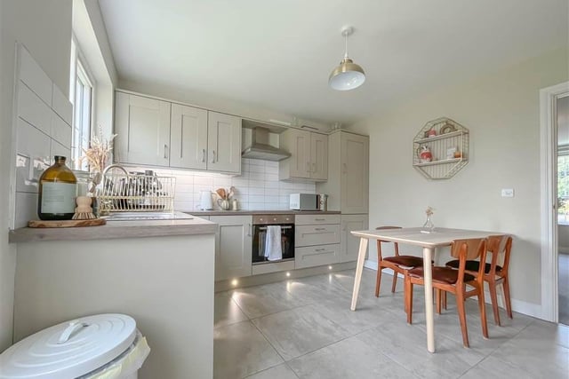 Kitchen/diner with range of high and low level units.