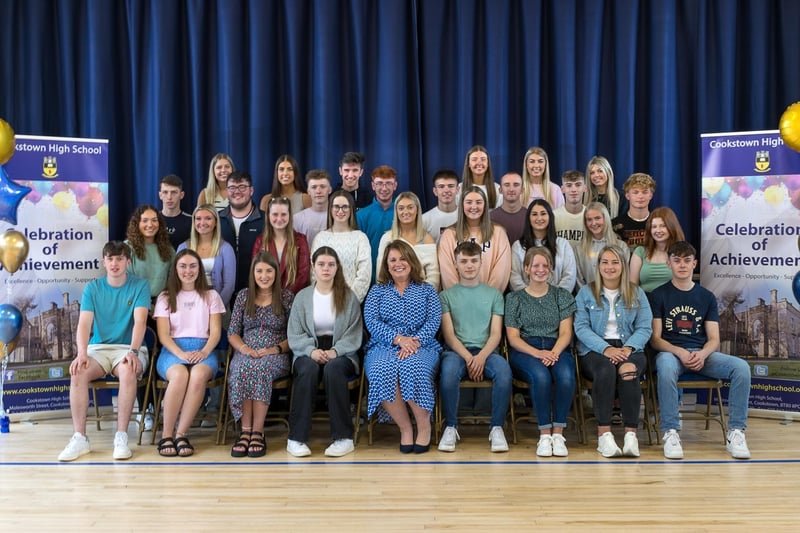 Pupils with 1 or more A grades at A2 Level pictured with the principal, Ms Evans.
